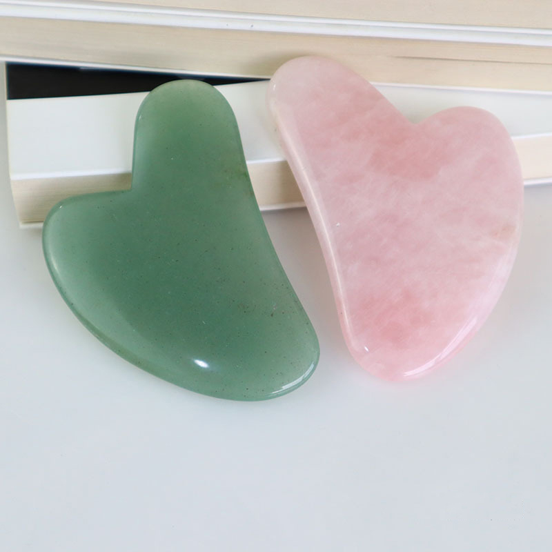 جهاز تدليك من حجر الكوارتز الو - مراجعة Gua Sha Tool Rose Quartz وسعره